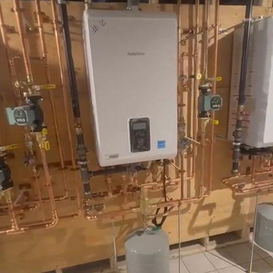 Copper distribution lines run through a mechanical room