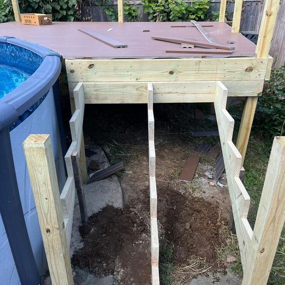post holes dug below the frost line for deck footings