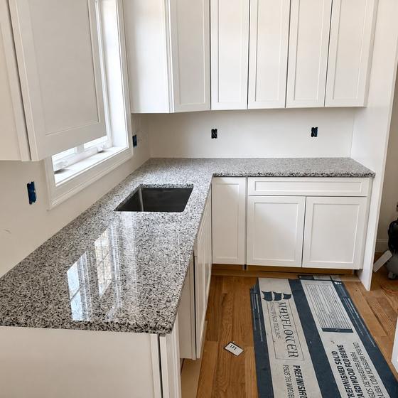 Crown and light rail on wall cabinets