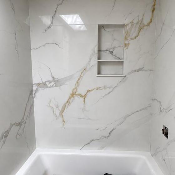 Marble look porcelain tub surround panels set, valve penetration still open