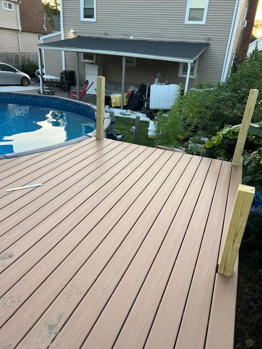Finished composite deck built around an above ground pool